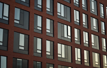 Fototapeta na wymiar facade of a red brick apartment house