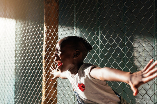African girl screaming in fear