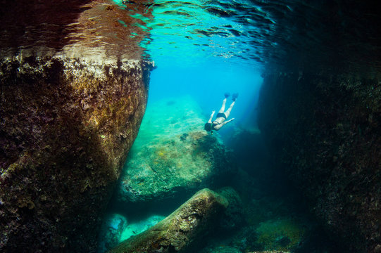 Female Diver with Reflection, Swimming in Cavern (Various Compositions)