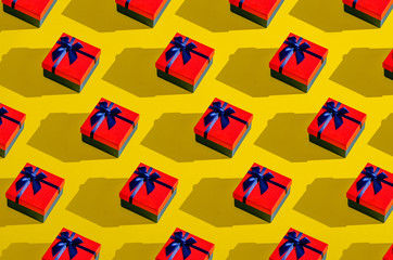Collage red gift box on yellow background