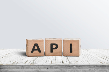 API app programming sign made of wooden blocks
