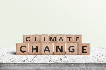 Climate change sign made of wooden cubes