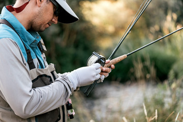 Fly fisherman using flyfishing rod