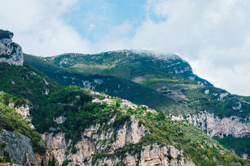 Fototapeta na wymiar Lovely View from the Cliffside Village Positano, province of Salerno, the region of Campania, Amalfi Coast, Costiera Amalfitana, Italy