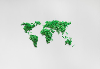 Green world map on white paper background