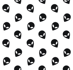 Vector seamless pattern of black alien face isolated on white background