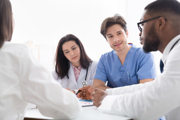 Fototapeta premium Doctors interacting at meeting in conference room