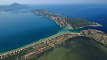 Aerial drone photo of iconic round shaped exotic sandy beach of Voidokoilia in the heart of Messinia, Gialova, Peloponnese, Greece