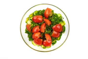 Vegetable salad, sliced cucumber and tomatoes, isolated on white background