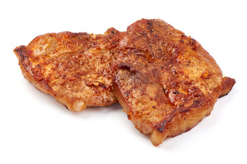 Baked juicy pork steak, isolated on white background