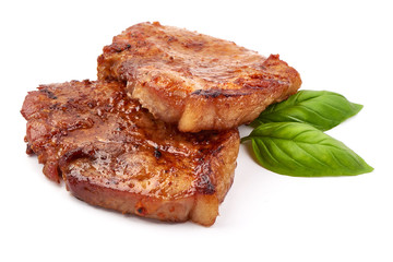 Fried juicy pork steak, isolated on white background