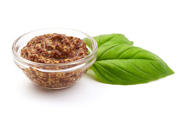 Grain Mustard sauce in a bowl, close-up, isolated on white background