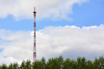 TV tower against the sky and clouds.