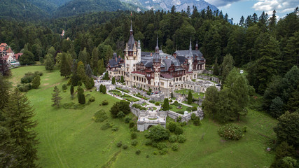 Aerial view of a castle in a forest on a sunny day!