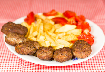 Traditional Turkish Meatball, potatoes and tomatoes