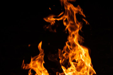 strong fire flames on black isolated background
