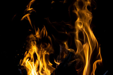 strong fire flames on black isolated background