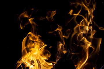 strong fire flames on black isolated background