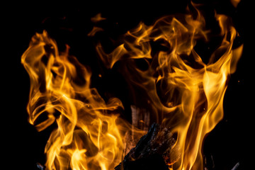 strong fire flames on black isolated background