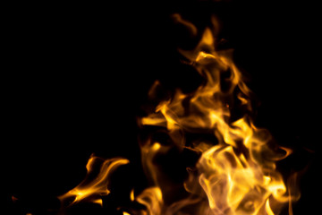 strong fire flames on black isolated background