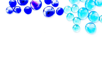 Bright stones on white background top view mock up