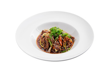 Wok with beef and green beans isolated on white