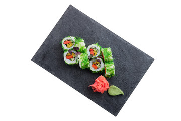 Set of rolls with seaweed chuka salad isolated on white