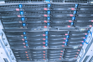 The computer hardware array is installed in the datacenter rack. Web server access is on the central technical platform. Cloud storage technology. Powerful server device is a close up
