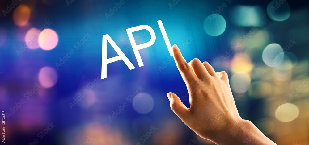 Wall mural api concept with hand pressing a button on a technology screen