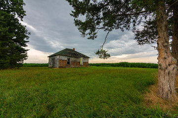 Abandoned farmhouse at sunrise