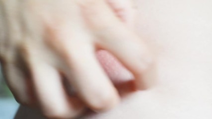 Scratching insect flea bite body chest foot by hand, itch