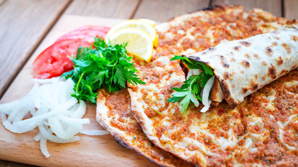 Turkish cuisine made with thin dough and minced meat 