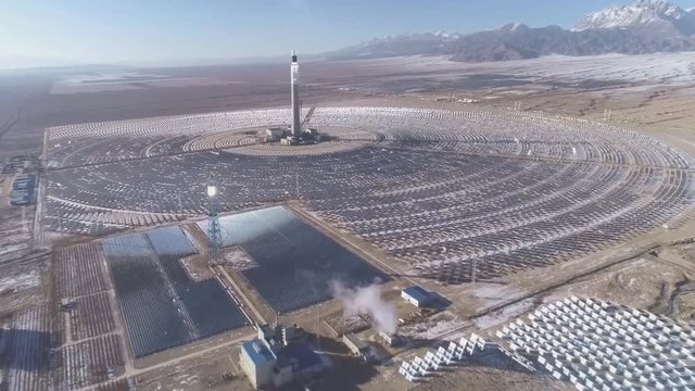 100-megawatt molten salt concentrating solar thermal power plant in Dunhuang, Northwest China's Gansu province (aerial photography)