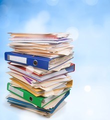 File folders with documents on white background