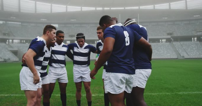 Male rugby players forming huddles in the ground 4k