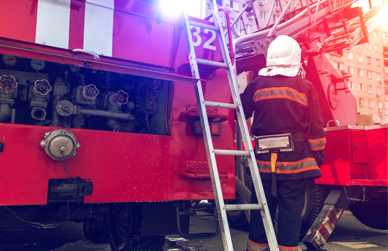  red fire truck with a ladder.