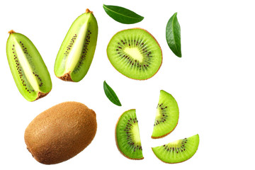 Fototapeta premium kiwi fruit with slices and green leaves isolated on a white background. top view