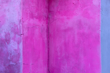 Blurred image of  pink wall texture. Pink wall texture background, cropped shot. Abstract colorful background. 