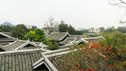 Traditional roofs of buildings in China. Ancient city Yangshuo, China