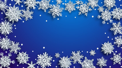 Christmas illustration of white complex paper snowflakes with soft shadows on blue background