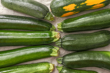 Fresh green zucchini on table