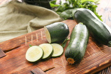 Fresh zucchini on wooden board