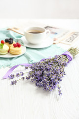 Beautiful lavender flowers on white table