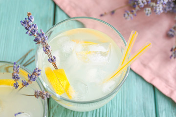 Glasses with lavender lemonade on wooden table