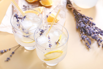 Glasses with lavender lemonade on table