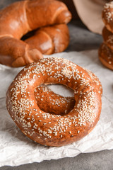 Tasty bagels on table