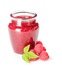 Jar of tasty raspberry jam on white background