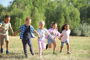 Group of running children in park