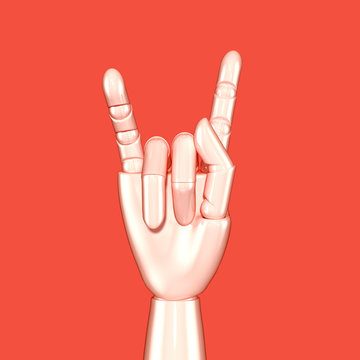 Isolated on pink artificial hand showing horns geisture