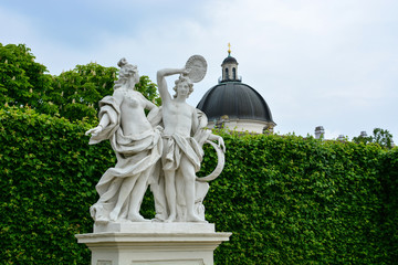 Baroque statues in the Belvedere building complex garden, Vienna, Austria